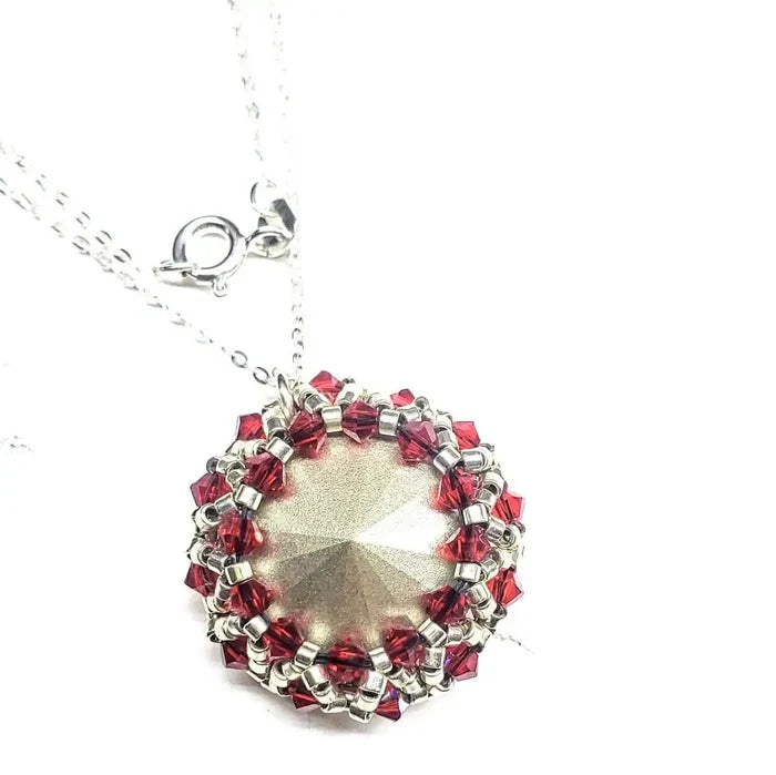 Beaded Super Sparkly Swarovski Rosette Star Pendant Necklace featuring a dazzling red crystal design.