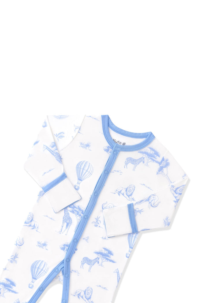 Close up of the snap closure blue trim and fold over hand cuffs on the Romper in Toile Safari
