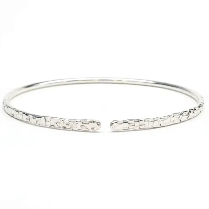 10 Gauge 925 Silver Hammer Textured Bangle showcasing a sleek design with a hammer finish.