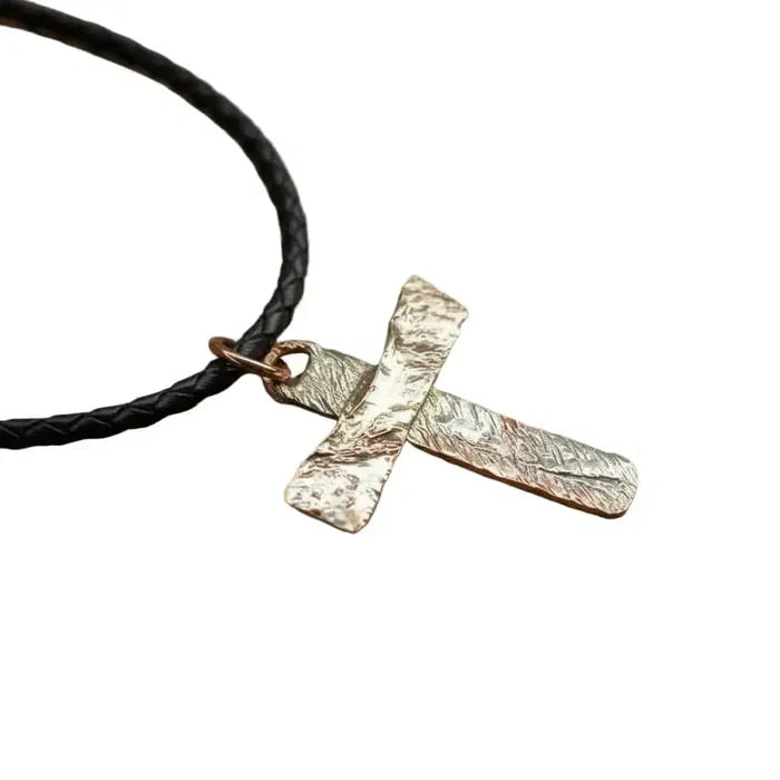 925 Silver Copper Hammer Forged Masculine Cross Necklace on a black cord.