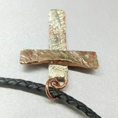 925 Silver Copper Hammer Forged Masculine Cross Necklace displayed with a black braided cord.