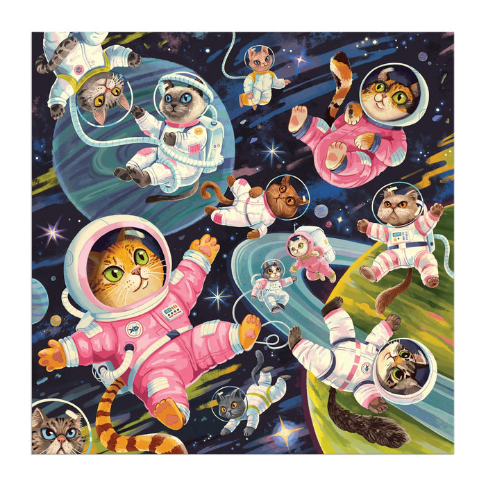 A Space Meowdyssey 500 Piece Puzzle by Lucia Baertl features playful cats in vibrant spacesuits exploring outer space, surrounded by stars and planets—a joyful, whimsical scene perfect for puzzlers and cat lovers alike.