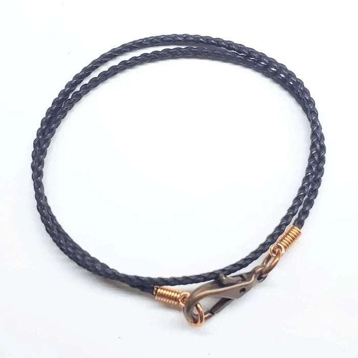 Handmade copper wire braided bail gemstone necklace featuring a stylish clasp and intricate braided design.