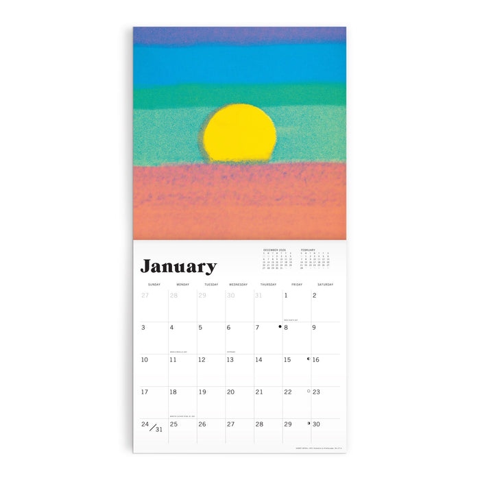 The Andy Warhol 12 x 12 Wall Calendar 2027 by the Andy Warhol Foundation features a January page with a vibrant abstract sun over blue, green, pink, and orange bands. January's days appear in a grid beneath the artwork.