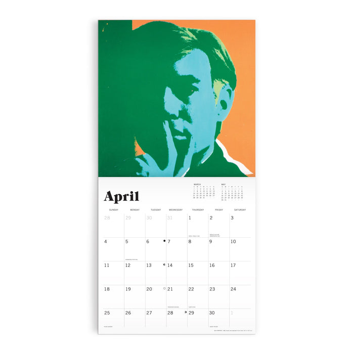 The Andy Warhol 12 x 12 Wall Calendar 2027 by the Andy Warhol Foundation For The Visual Arts features an April page with a pop art portrait of a person holding a finger to their lips on an orange and green background, plus an April date grid.