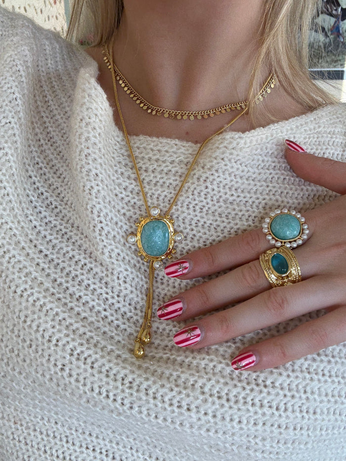 Layered gold necklaces styled for everyday jewellery stack