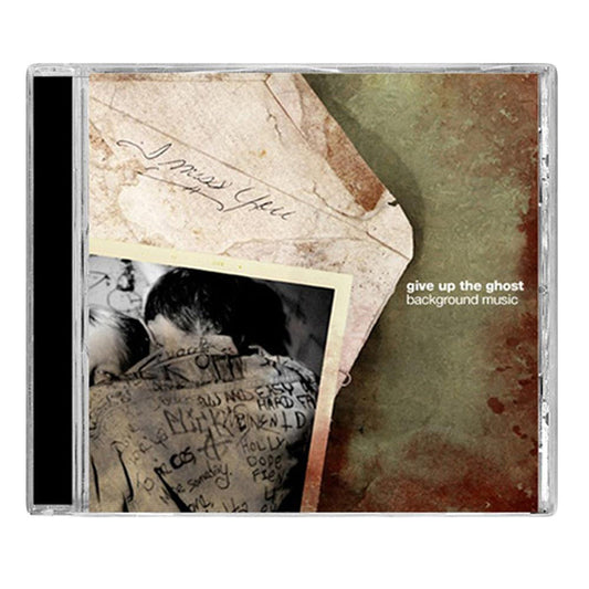 CD cover for Give Up The Ghost’s Background Music, with a faded photo of two people hugging and handwritten notes like “I miss you.” The nostalgic, vintage design captures the raw emotion of hardcore music.