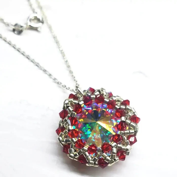 Beaded Super Sparkly Swarovski Rosette Star Pendant Necklace featuring vibrant red crystals and a sparkling centerpiece.