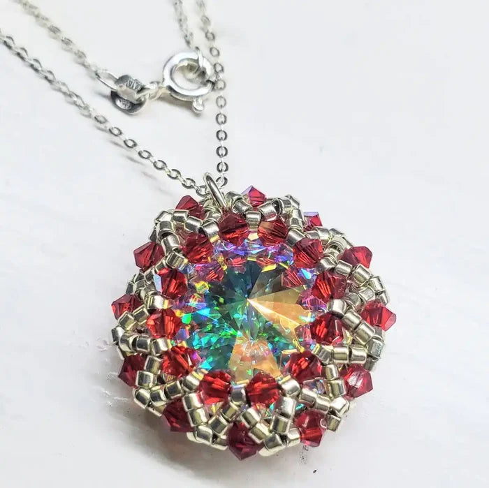 Beaded Super Sparkly Swarovski Rosette Star Pendant Necklace showcasing a colorful crystal centerpiece surrounded by red beads.