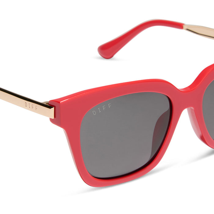 diff eyewear featuring the bella xs square sunglasses with a sunset bright coral frame and grey lenses detailed view