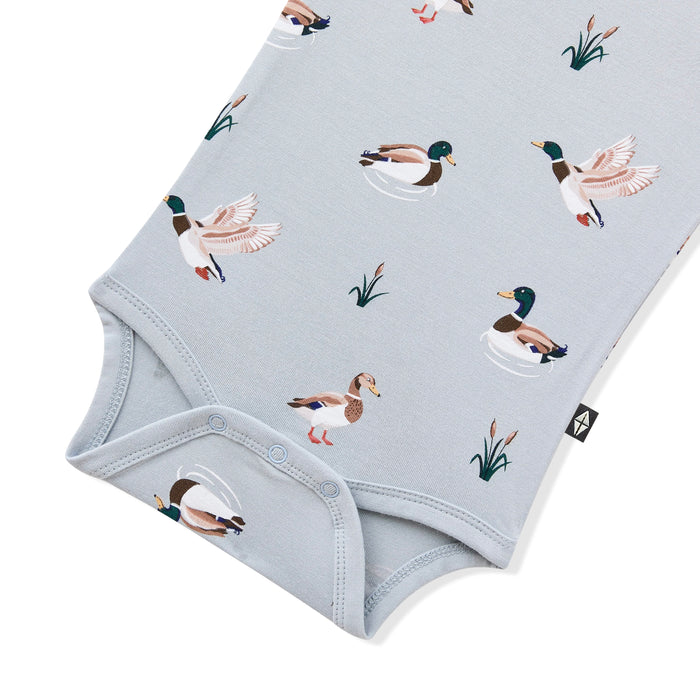 Close up of the snap closures shown on the Bodysuit in Mallard Duck