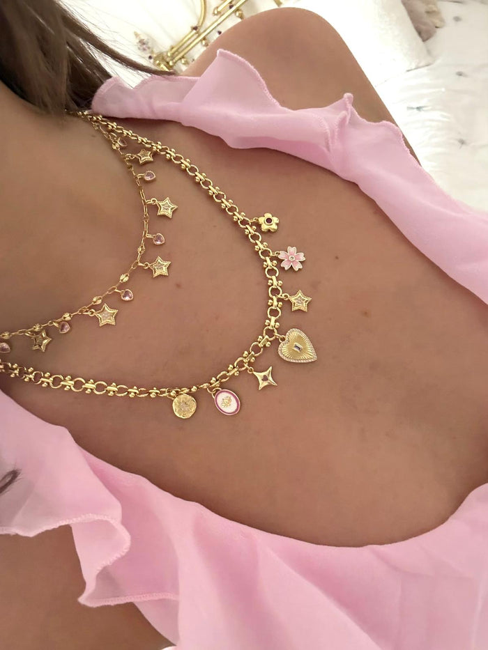 Iconic charm necklace styled for layering