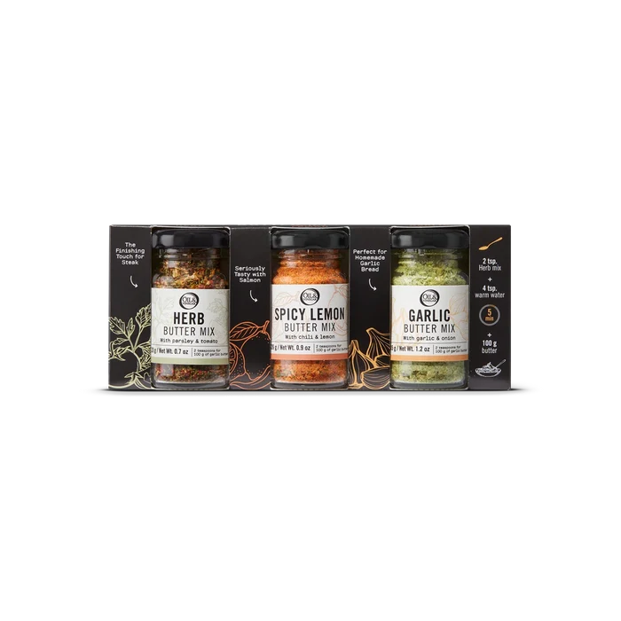 Set of three spice jars with labels on a white background