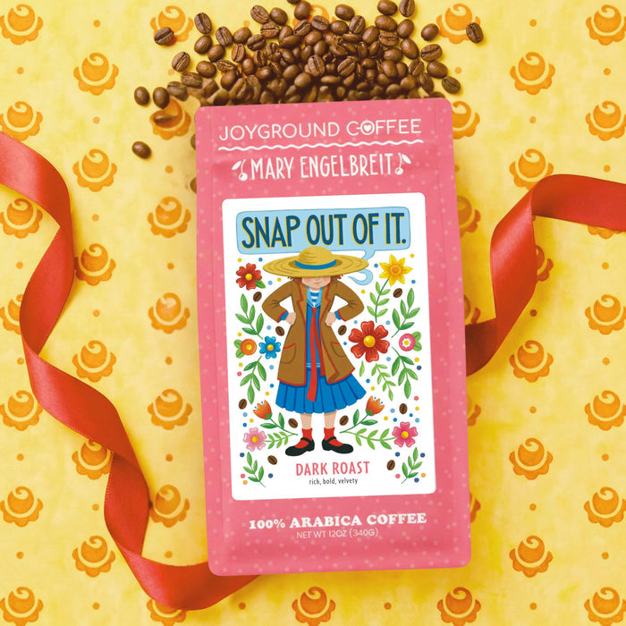 Mary Engelbreit Joyground Coffee Snap Out of It Dark Roast flat lay