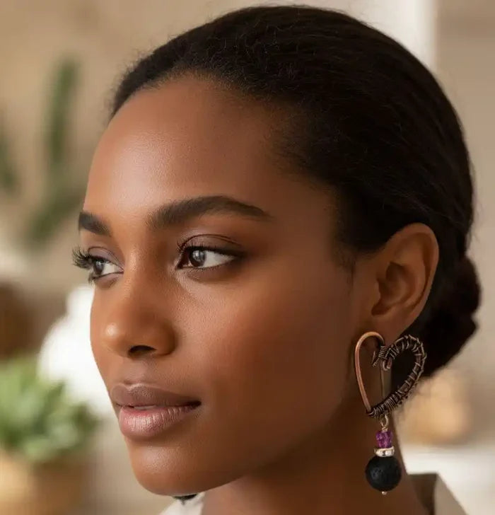 Copper Sculpted Heart Hoop Crystal Lava Rock Earrings worn by a model showcasing artisan jewelry.