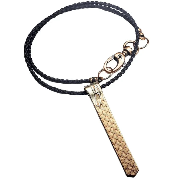 Copper Weave Embossed Necktie Necklace featuring a bold pendant and braided black cord.