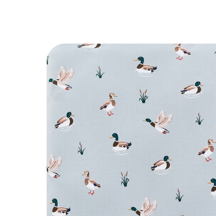 Close up of the Crib Sheet in Mallard Duck shown on a crib mattress