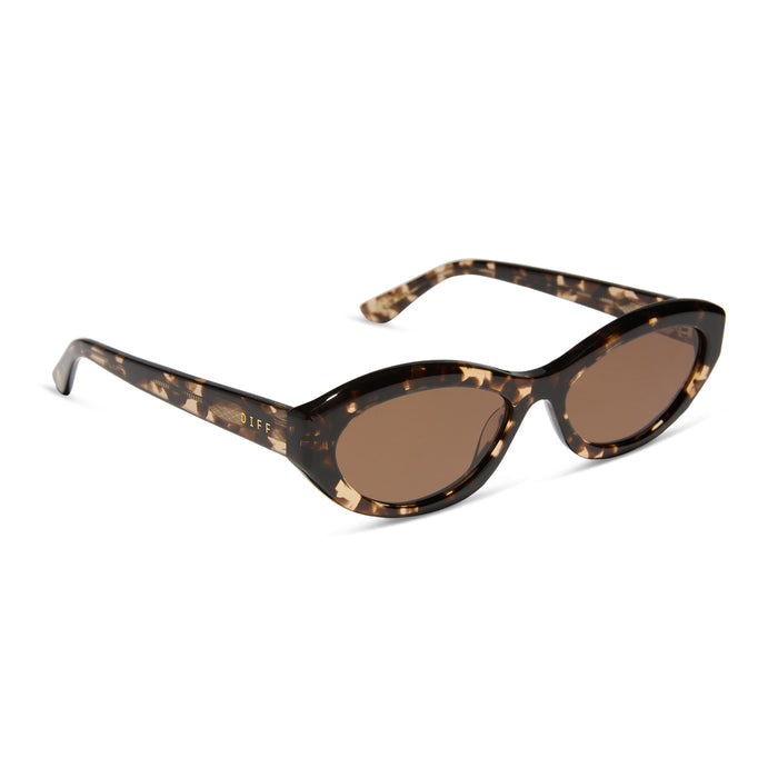 jessie james decker x diff eyewear featuring the dolce bella oval sunglasses with a espresso tortoise frame and brown lenses angled view