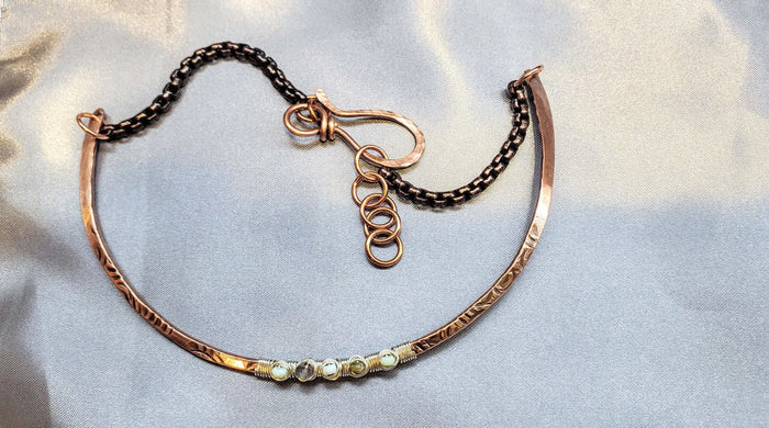 Ergonomic Copper Sculpted Embossed Wire Gemstone Choker featuring Peruvian opal gemstones and artistic metalwork craftsmanship.