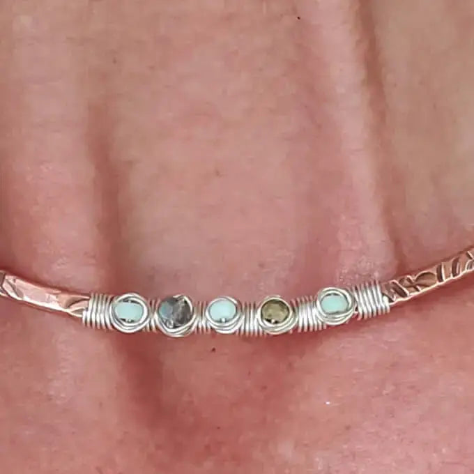 Ergonomic Copper Sculpted Embossed Wire Gemstone Choker featuring mystical opal gemstones and unique metalwork design.
