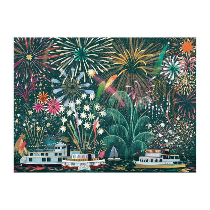 The Sarah Long Fireworks Jubilee 1000 Piece Foil Puzzle features colorful fireworks bursting above boats and a sailboat on a river, with vibrant reflections of pink, green, yellow, and blue lighting up the water below.