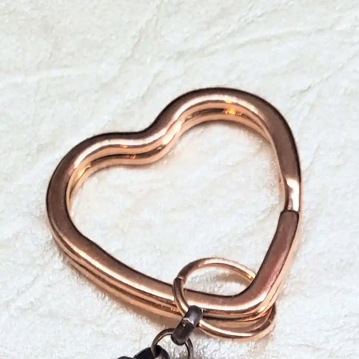Handmade Caregiver Crystal Copper Ribbon Heart Key Chain, featuring a delicate copper heart charm on a textured background.