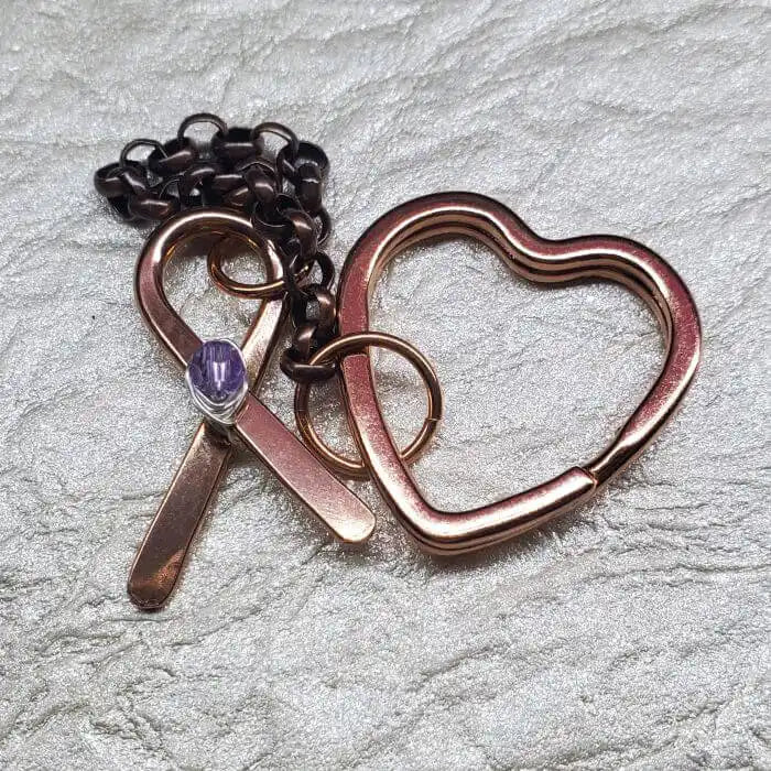 Handmade Caregiver Crystal Copper Ribbon Heart Key Chain featuring a copper ribbon charm and heart shape.