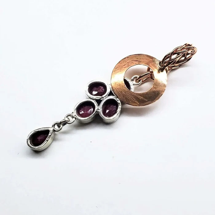 AMD1335Handmade Copper 5 Wire Braided Hammered Ruby Donut PendantCharms & PendantsNecklace$ 91.00Alexa Martha Designs