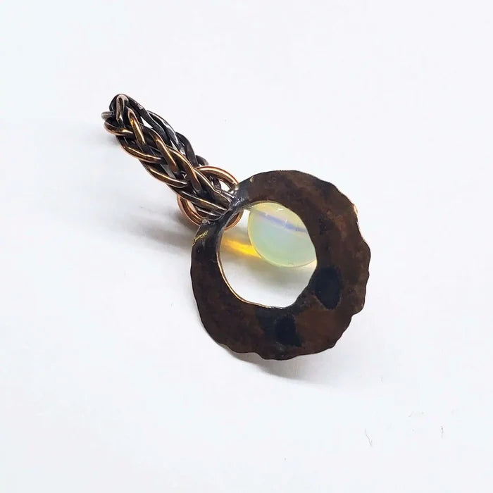 Handmade copper wire braided bail gemstone necklace featuring rare Luminite gemstone with unique design.