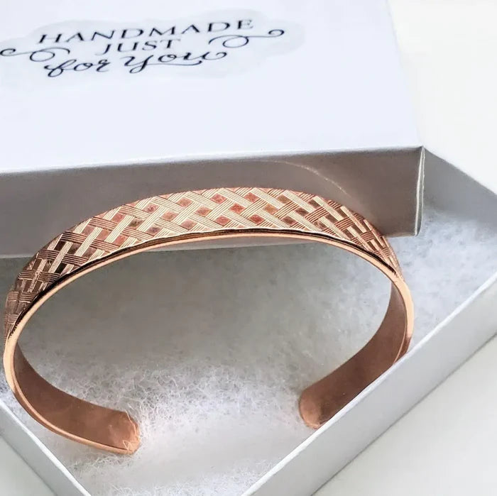 His and Her Copper Embossed Weave Cuffs 16 Gauge inside a gift box with a handmade note.