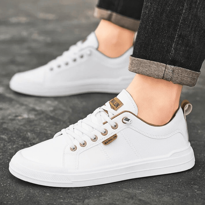 Side profile of a classic leather low-top sneaker