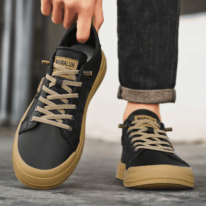 Detailed view of leather sneaker upper and lace-up closure