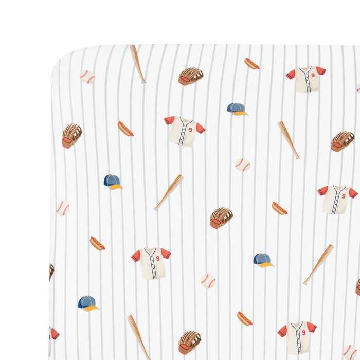 Close up of the Mini Crib Sheet in Home Run on a mattress