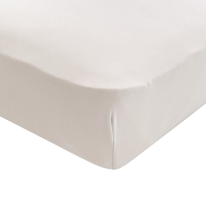 Corner of Kyte Baby Mini Crib Sheet in Oat
