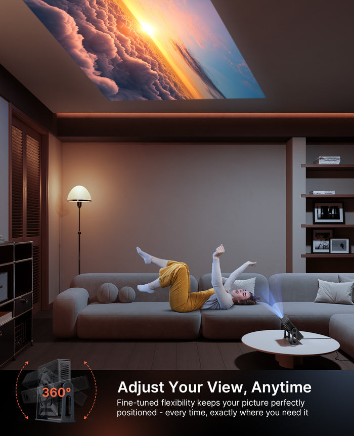 A person is lying on the sofa watching the projected image from a projector
