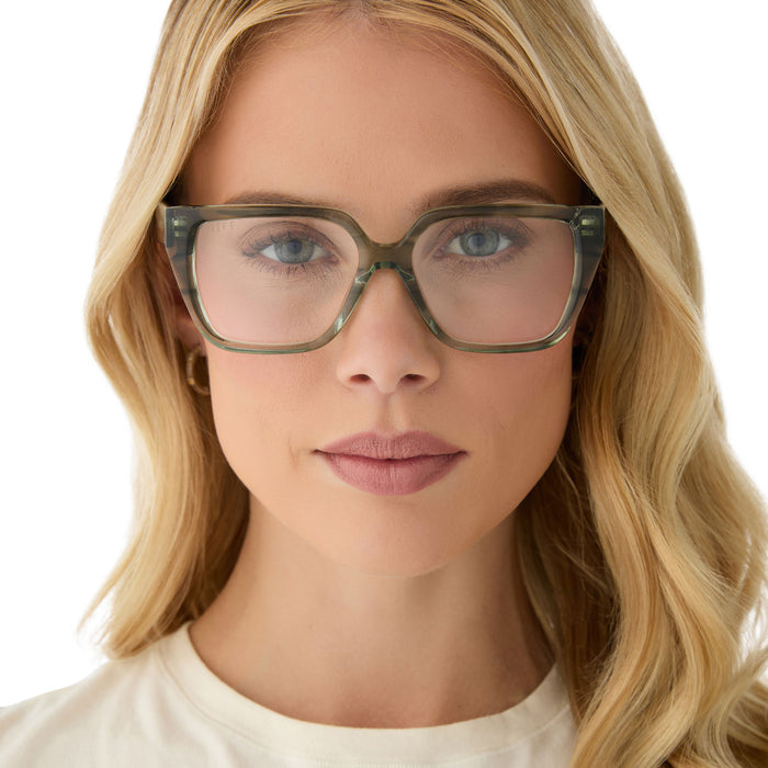 on model - female wearing diff eyewear featuring the olive square prescription glasses with a cool matcha green frame and prescription lenses front view