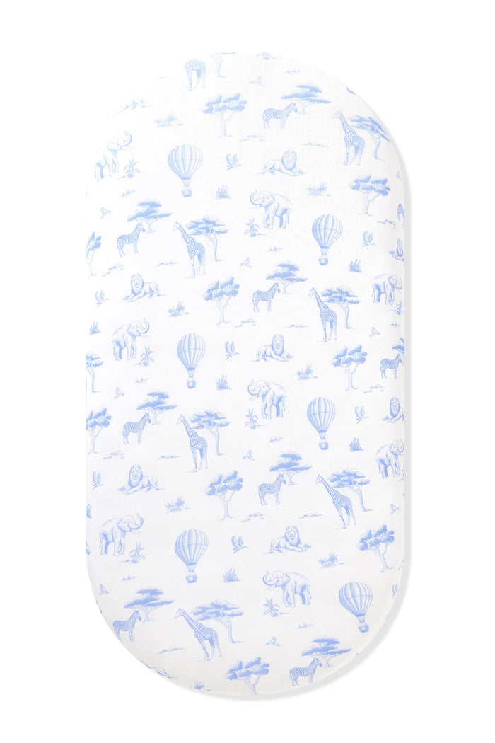 Oval Bassinet Sheet in Toile Safari shown on an oval mattress