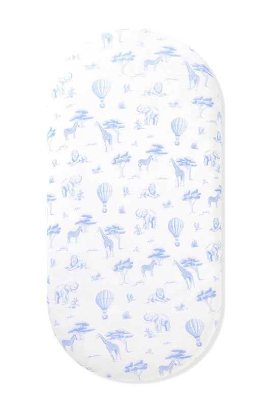 Oval Bassinet Sheet in Toile Safari shown on an oval mattress