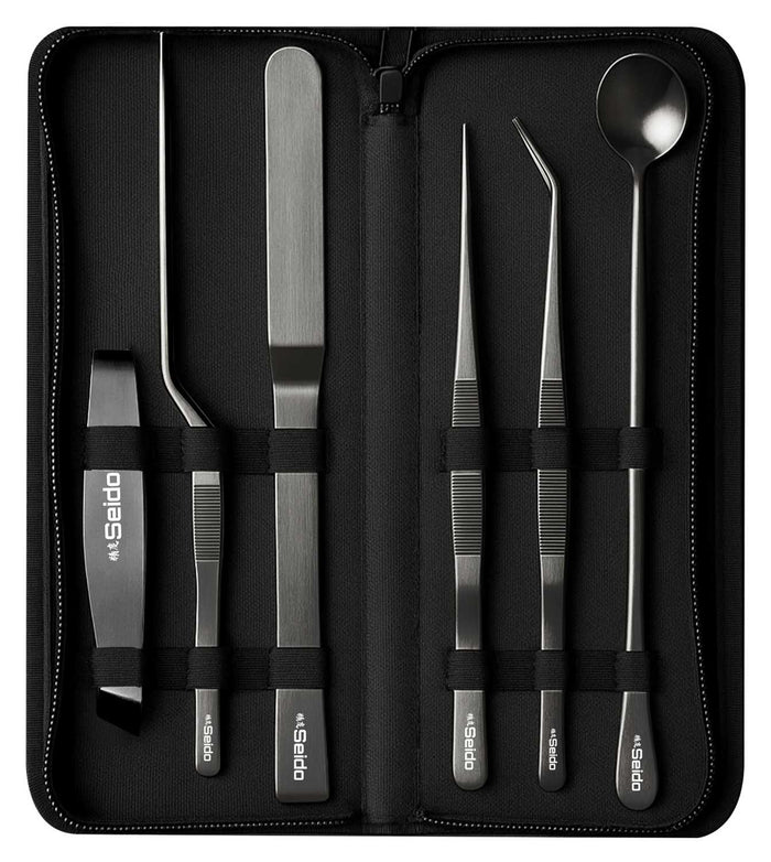 Seido 6-piece plating tweezer set laid out with protective case and tools.