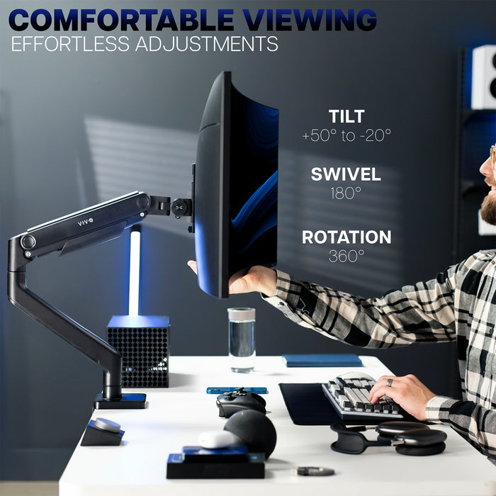 Person using a adjustable monitor stand with text highlighting features on a dark background