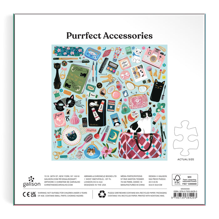 The back of the Christine De Carvalho Purrfect Accessories 500 Piece Foil Puzzle box features colorful cat-themed accessories and playful black-and-white cats, with the title “Purrfect Accessories” highlighting this charming puzzle.
