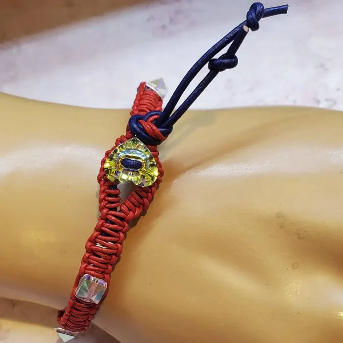 Red White and Blue Macrame Wire Wrap Crystal Spike Bracelet showcasing intricate knotwork and Swarovski crystals.