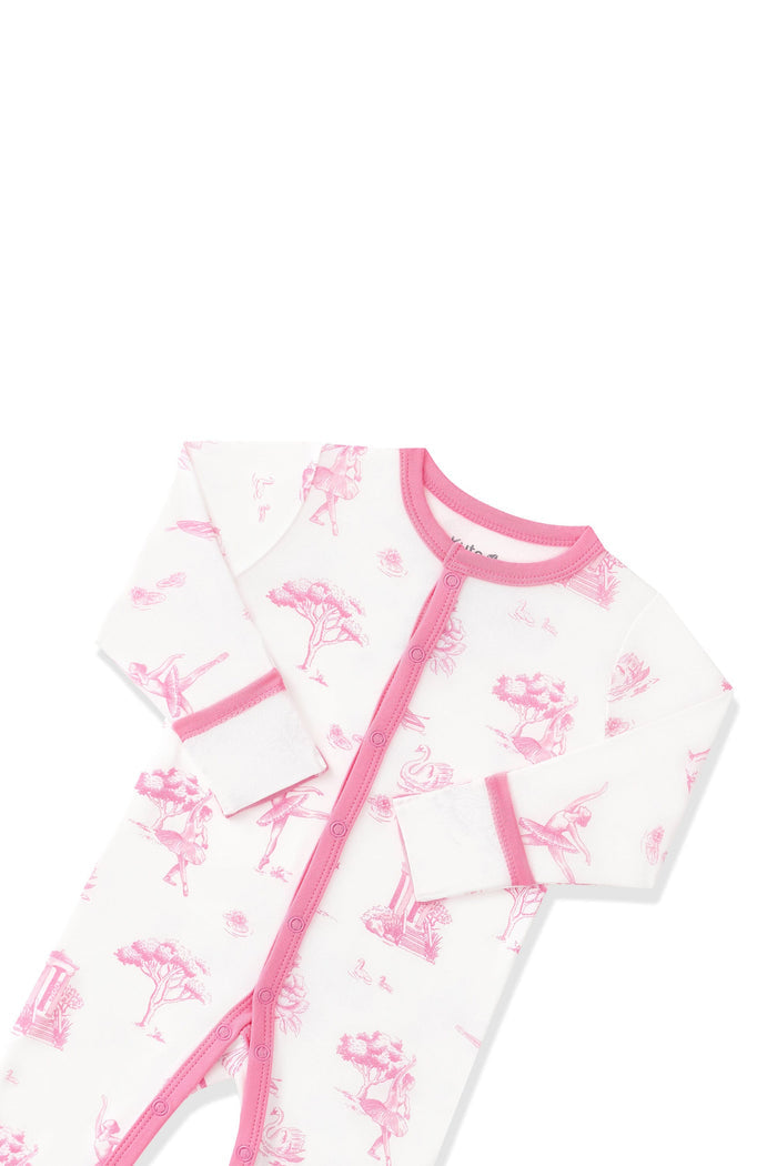 Close up of the pink snap trim and fold over hand cuffs on the Romper in Toile Ballet