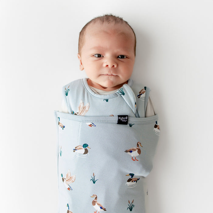 Close up of newborn swaddled in the Sleep Bag Swaddler in Mallard Duck