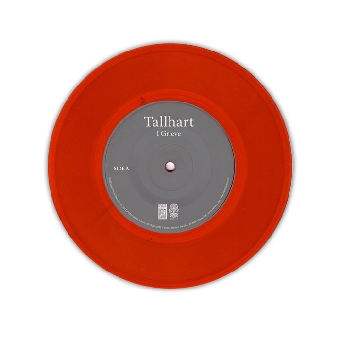 A transparent red TALLHART vinyl record, 'I Grieve,' features a gray center label with the title and side A, set on a white background. This limited edition includes a free download card.