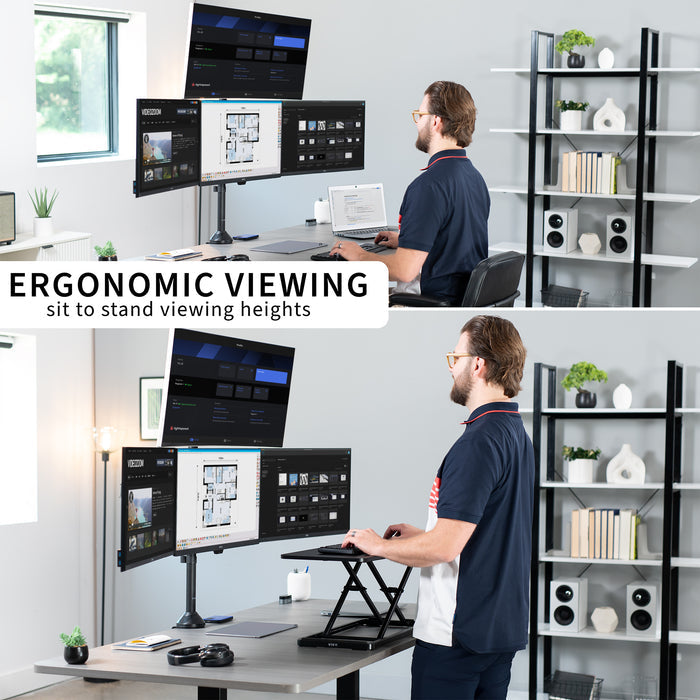 Person using a standing desk with ergonomic viewing setup in a home office.