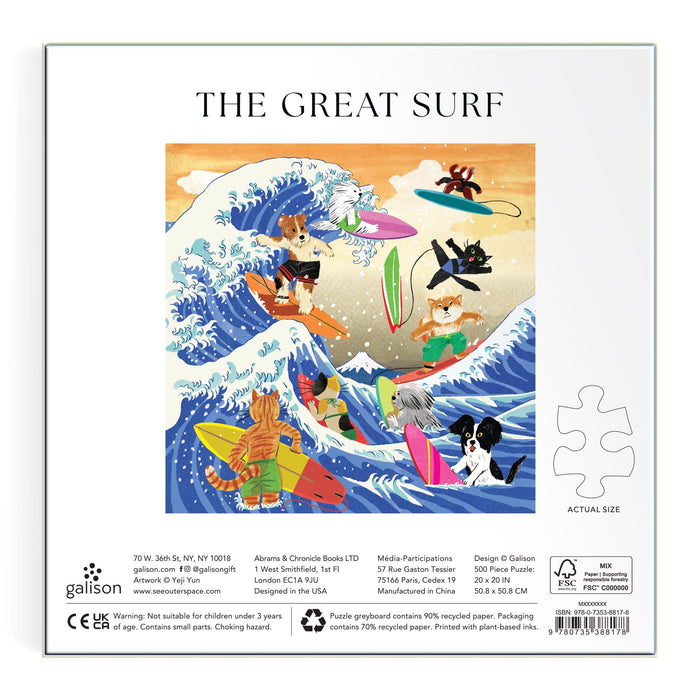Experience the playful energy of "The Great Surf 500 Piece Puzzle" by Yeji Yun, featuring dogs surfing on vibrant boards, some with sunglasses or life jackets, all riding a huge ocean wave under a bright sky.