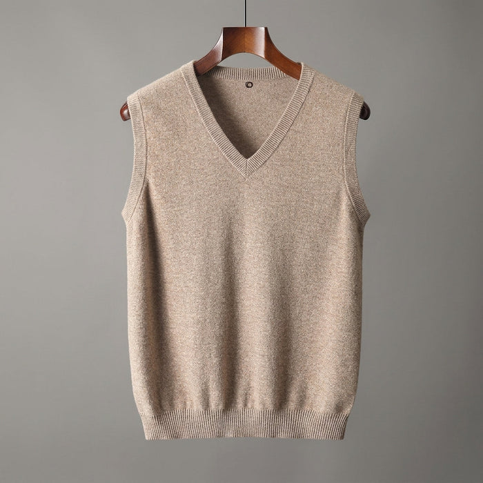 Close-up of the sweater vest's textured knit fabric and V-neckline