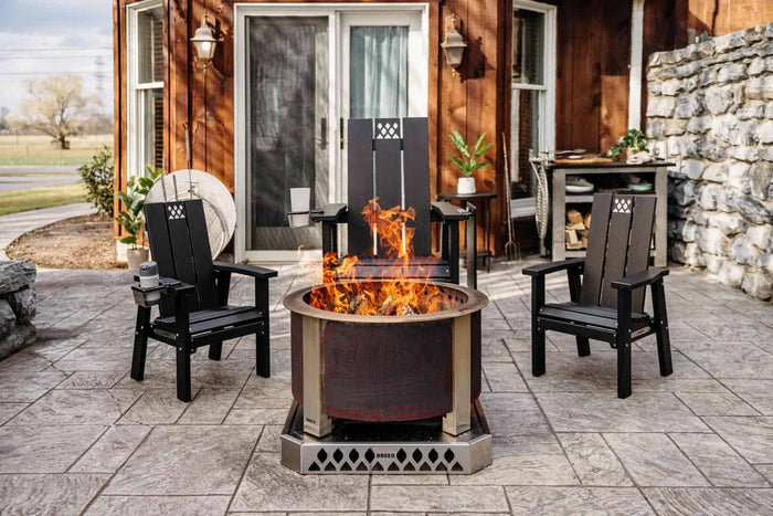 This is an image of small Breeo kids chairs set up around the fire